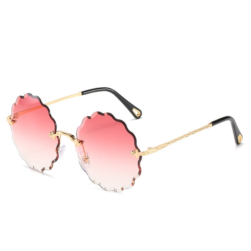 Woman’s Diamond Trim Frameless Sunglasses